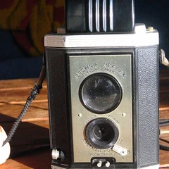 A Brownie box camera with two round lenses